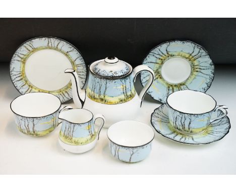 Royal Doulton blue ground 'Pollards Willow Pattern' tea set, R No 718210, comprising of teapot, two saucers, three cups, smal
