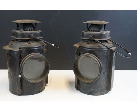 Pair of 20th century railway lantern lamps by Adlake, H 35cm