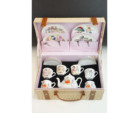 Reutter Porzallan, The world of Beatrix Potter picnic basket tea set to include teapot, milk jug, lidded sugar bowl, four cup