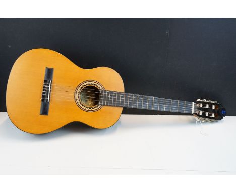 Valencia classical guitar model no VC201 with plectrum holder to head 