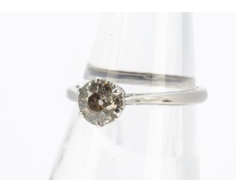 A diamond solitaire, the old cut ring in claw setting, on a white 18ct marked shank, ring size R, diamond weight 1.05ct, heav