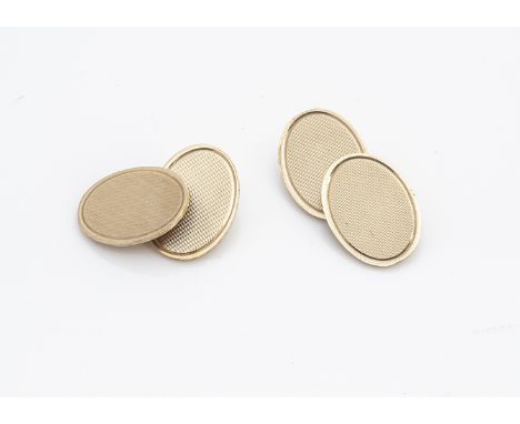 A pair of 9ct gold engine turned oval linked cufflinks, 1.8cm x 1.3cm, 9g 