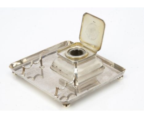 An Art Deco silver inkwell and stand from Hukin &amp; Heath, square tray, 20.5cm, with inset square inkwell and applied pen r