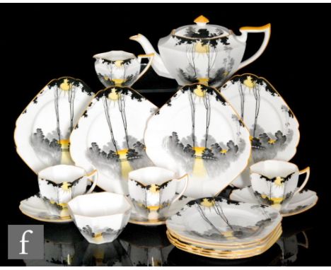 A 1930s Shelley Art Deco Queen Anne shape teapot decorated in the Tall Trees pattern, S/D, together with three matching teacu