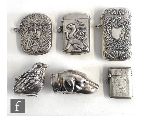 Five modern Sterling silver vesta cases one modelled as a seated chick, with an earlier engine turned example. (6) 