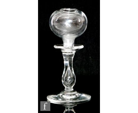A late 18th to early 19th Century lace makers lamp, the&nbsp;spherical oil reservoir bowl above the tear drop stem, raised to