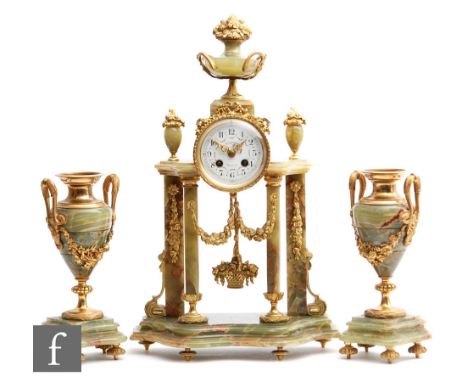 A 20th Century gilt metal mounted green onyx clock garniture, the enamel floral suspended dial named Esquerre Toulouse, heigh