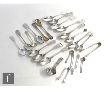 A small parcel lot of assorted hallmarked silver flat ware to include tea and condiment spoons, a caddy spoon, sugar tongs et