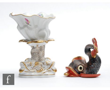 A Herend menu or card holder modelled as a fish in black and red with gilt detailing, blue printed mark, height 8cm, together