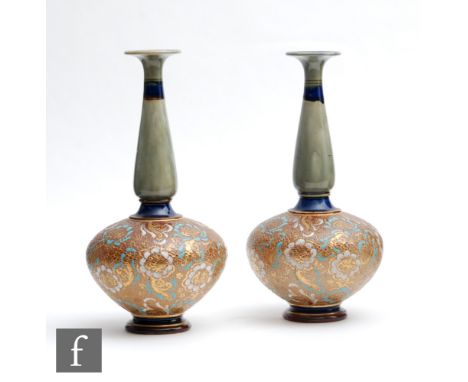 A pair of early 20th Century Royal Doulton Chine Ware vases of compressed globular form with a shaped slender neck and squat 