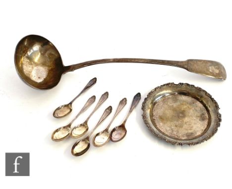 A hallmarked silver fiddle pattern soup ladle of plain form with engraved crest to terminal, length 35cm, London 1817, with a