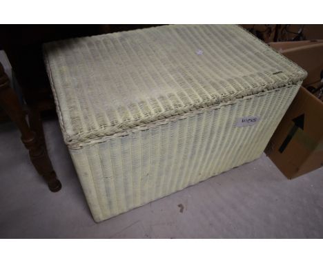 A vintage Lloyd Loom bedding box