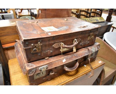 Two vintage leather travel cases