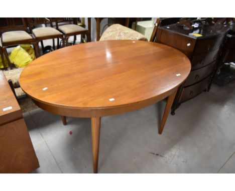 A vintage teak oval dining table, approx. 137 x 97cm