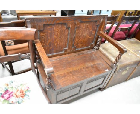 An early 20th Century oak monks bench , width approx 91cm