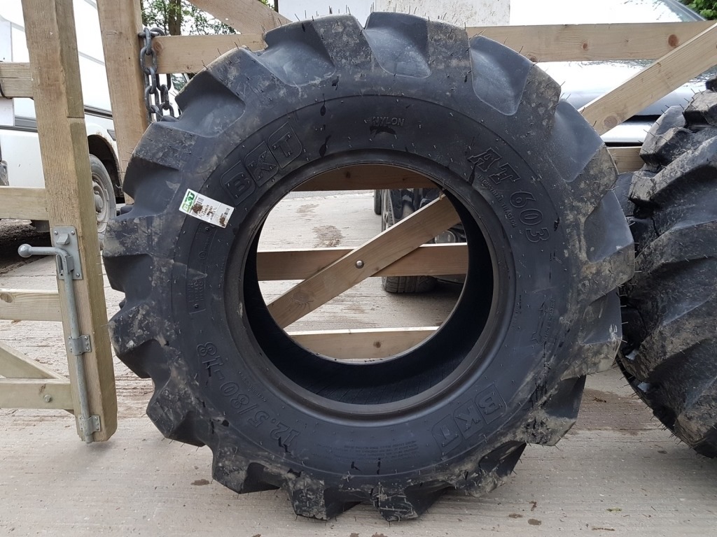 2 X NEW AND UNUSED BKT 12.5-80-18 AT603 12 PLY TYRES, SUIT JCB 3CX, CAT ...