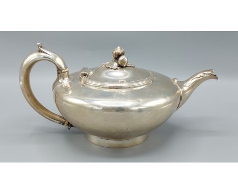 A Victorian silver teapot of circular form, London 1840, marker mark W.M, 26ozs, 13cms tall 