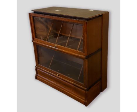 Part of a Globe Wernicke style bookcase together with a mahogany side cabinet with cupboards above drawers 