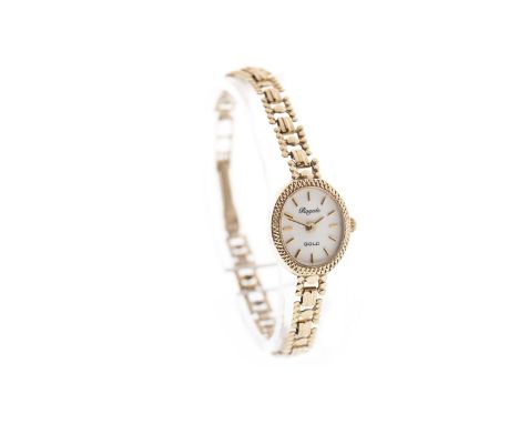 LADY'S ROYALE NINE CARAT GOLD QUARTZ WATCH, the oval dial with applied gold baton hour markers, gold pencil hands, 14mm case 