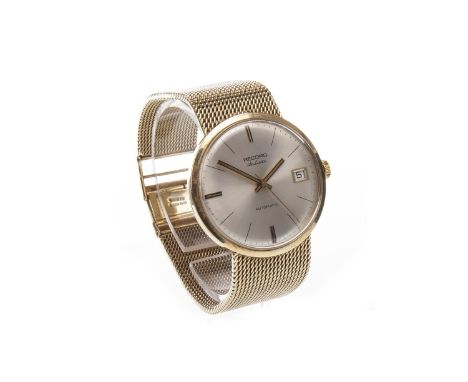 GENTLEMAN'S RECORD DE LUXE NINE CARAT GOLD MANUAL WIND WRIST WATCH, the round white dial with applied baton hours at 6, 9 and