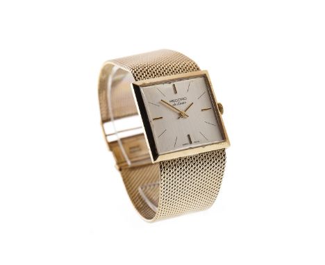 GENTLEMAN'S RECORD DE LUXE NINE CARAT GOLD MANUAL WIND WRIST WATCH, the square cream dial with applied baton hour markers at 
