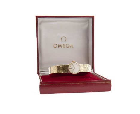 LADY'S OMEGA EIGHTEEN CARAT GOLD MANUAL WIND WRIST WATCH, originally purchased 1964, the round white dial with applied gold c