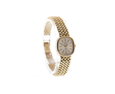LADY'S MARVIN REVUE QUARTZ WRIST WATCH, the rounded square dial with applied gold baton hour markers, gold pencil hands, 15mm