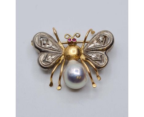18ct gold butterfly brooch with pearl body and ruby eyes 3g. 25cms wide 