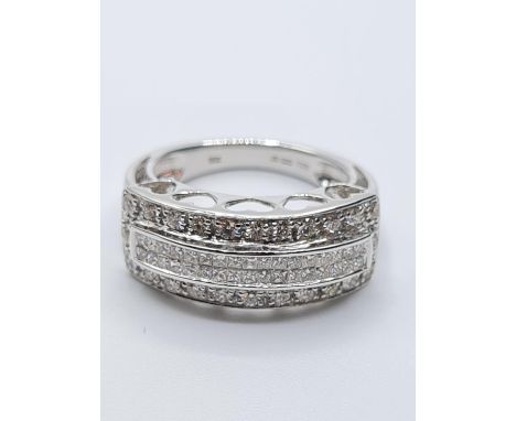 18ct white gold diamond set 3 row band ring, weight 6.5g and  0.65ct diamonds, size K 