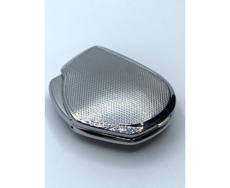 Vintage flaminaire lighter having original presentation case, satin lined and stamped flaminaire paris. Engine turned design 