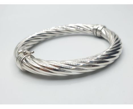 sterling silver twisted bangle, weight 20g and 7.5cm wide 