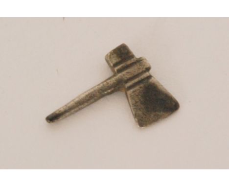 A Roman silver miniature votive axe, diameter 1.4cm