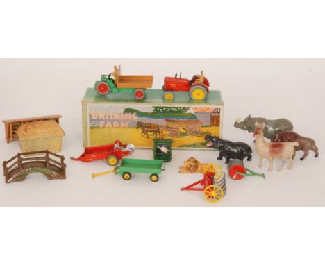 A Britain's No 5F Farm Wagon, a single horse plough with ploughman, an unnamed farm log cart with logs together with a Dinky 