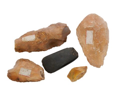 Three Paleolithic stone flint knapped axe heads together with a fragment and smoothed axe head, longest 15cm. (5)

