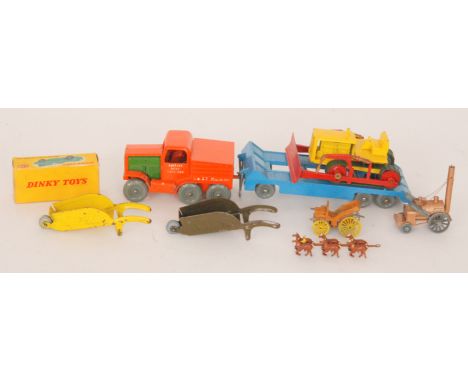 A British made earth remover with tractor and trailer, boxed, together with a Dinky No 238 Jaguar type D racing car, together