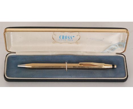 A 14K gold cased Irish Cross ball point pen marked .585, in a presentation case.