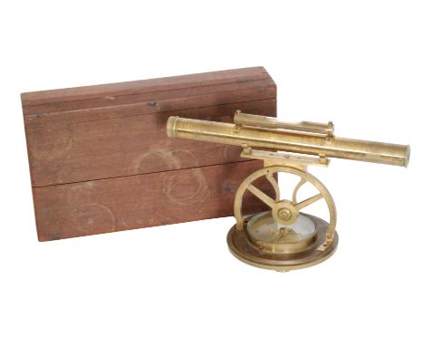 An early 19th Century brass compass by W C Cox Devonport with theodolite attachment in a fitted mahogany case, height 23cm