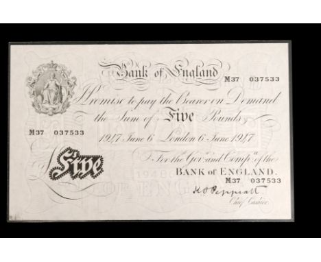 Bank notes - Bank Of England 1947 white five pound note No M37 037533, cashier K O Peppiatt together with two Cambodian 1000 