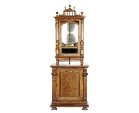 A Symphonion model 106N upright disc musical box playing 19 1/8 inch discs, penny in the slot operation on duplex combs in ca