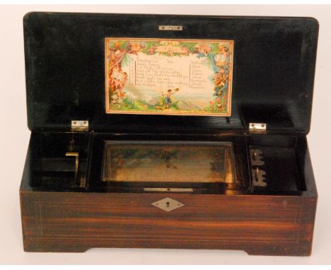 A rosewood venered musical box playing eight airs, serial number 18820 with tune card, 15cm cylinder, width 43cm.