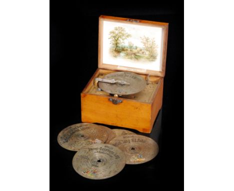 A Symphonion No 20 style disc musical box, clockwork operation serial number 510111, single comb playing six 4 3/4 inch discs