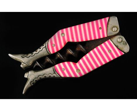 A novelty lady's legs corkscrew in the manner of Steinfield and Reimer, with pink and white celluloid scales, indistinctly st