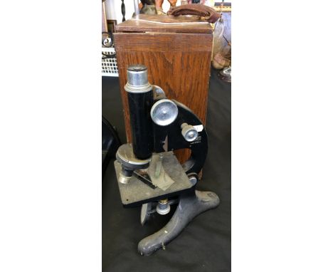 A Beck of London model 29 microscope in oak box.