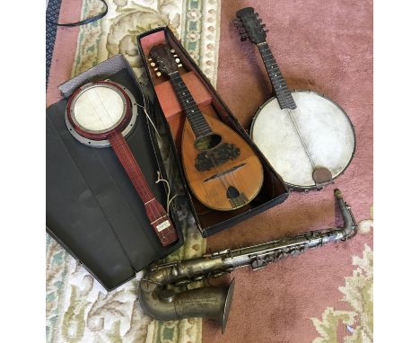 A cased wooden mandolin with label to interior reading 'Grande Fabrica de Strumenti Armonici Domenico Ventazola Napoli', toge