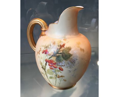 An early 20th Century Royal Worcester blush ware floral pattern jug with gilt coloured handle, numbered to base 1094, height 