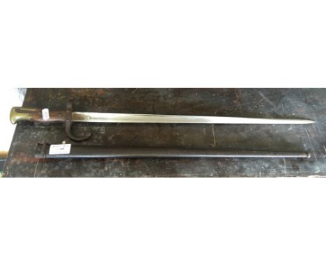 A 19th Century French 1874 pat gras bayonet with scabbard.