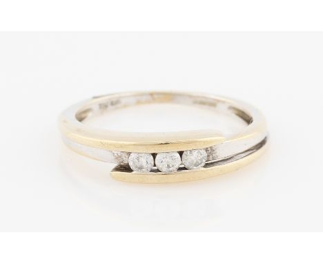 SOLD WITHOUT BUYERS PREMIUM AND VAT. An 18ct white and yellow gold diamond three stone ring, bar set with three round brillia