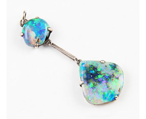 An early 20th Century style boulder opal pendant, comprising of an irregular pear shaped opal cabochon suspended from a knife