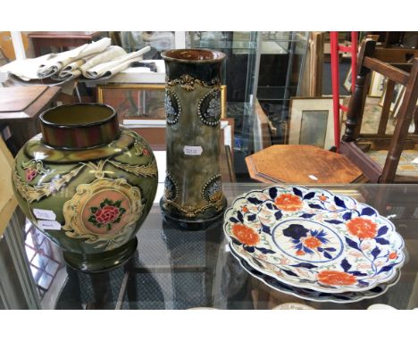 An early 20th Century Royal Doulton stoneware vase with scroll and foliage design, Royal Bonn floral vase and two oriental pl