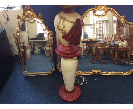 A large bulbus ceramic table lamp, with shade on matching stand.